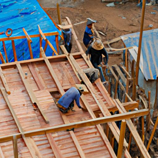 Nhóm công nhân sử dụng ván ép Bắc Giang để xây dựng nền móng nhà cửa chắc chắn và bền vững.